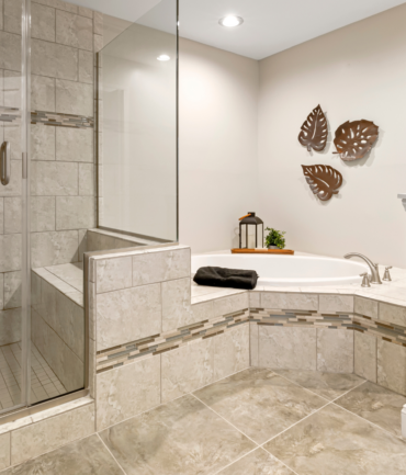 Modern ceramic tile bathroom renovation with sleek design and high-quality finishes.